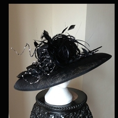 by thomas watts millinery.
