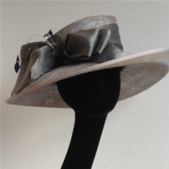 by vivien sheriff millinery. silver east-west brim with organza bow.
