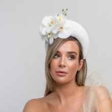 white crown with floral detail