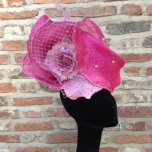 a one-off pretty pink sculptured sinamay headpiece.