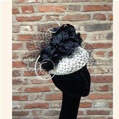 ivory beret with black hydrangeas and veiling. as with most of our styles this can be made in any colour scheme.
