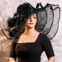 extra special large bold statement hat by guibert. freeform brim with handmade roses.