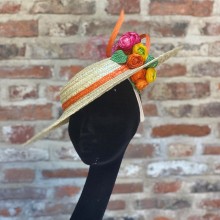 straw boater with roses in citrus tones